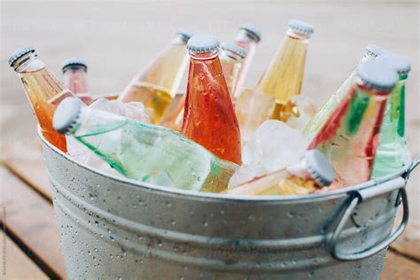 "Beverage Cooler Full Of Drinks On The Beach." by Stocksy Contributor "BONNINSTUDIO " - Stocksy