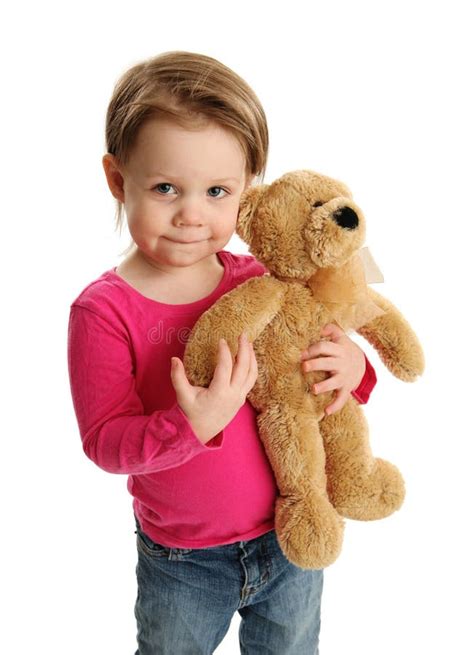 Young Child Holding a Teddy Bear Stock Image - Image of lovely, gift: 30367405