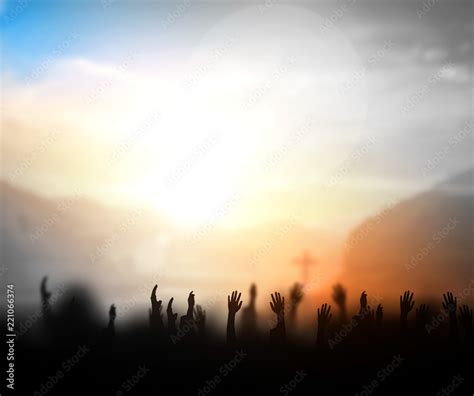 Praise and worship concept:Silhouette of Christian prayers raising hand ...