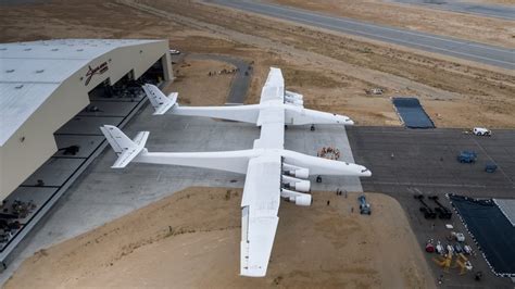 Stratolaunch, the world's largest plane, emerges from its hangar for the first time