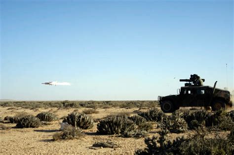 A soldier tests his skill with the tube launched optically tracked wire guided missile system ...