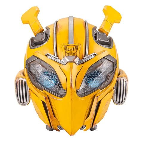 a close up of the head of a yellow robot