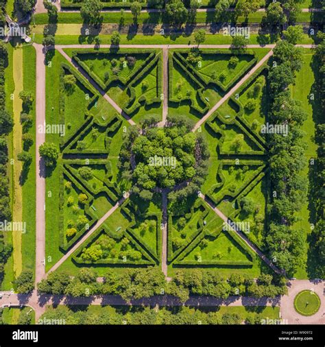 Square fragment of green formal garden aerial top view at sunny day Stock Photo - Alamy