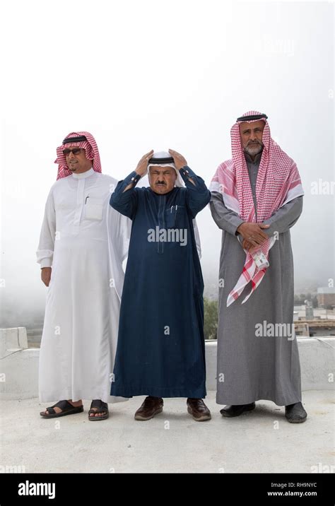 Portrait of three sausi men in traditional clothing, Asir province ...