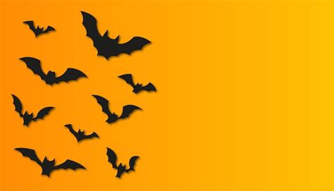 Premium Vector | Halloween orange background with bats