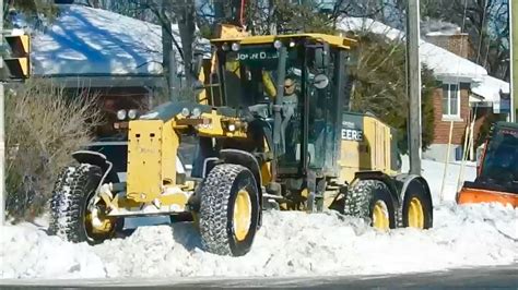 Snow Removal John Deere Grader Plowing Heavy Snow - YouTube