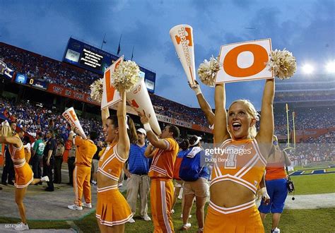 Cheerleaders of the Tennessee Volunteers try to get the fans into the... | Tennessee volunteers ...