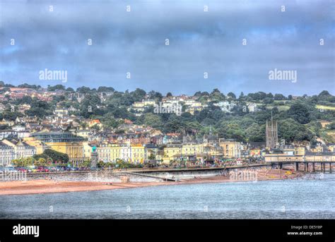 View of Teignmouth town beach and seafront Devon England, traditional English tourist town scene ...