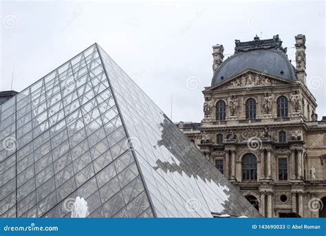 Louvre Museum pyramid editorial stock photo. Image of monument - 143690033