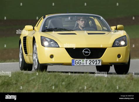 Car, Opel Speedster, model year 1999-, Convertible, open top, yellow ...