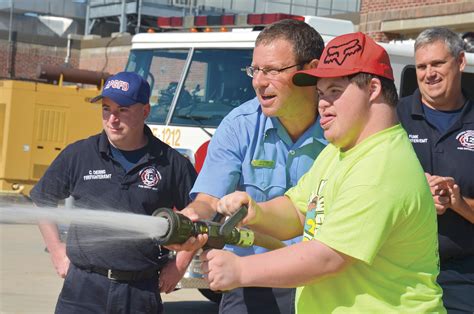 APG firefighters, police officers host open house for special needs summer camp | Article | The ...