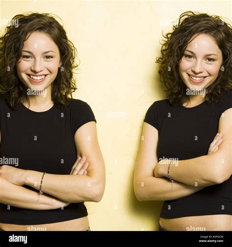 Identical twin teenage girls Stock Photo - Alamy