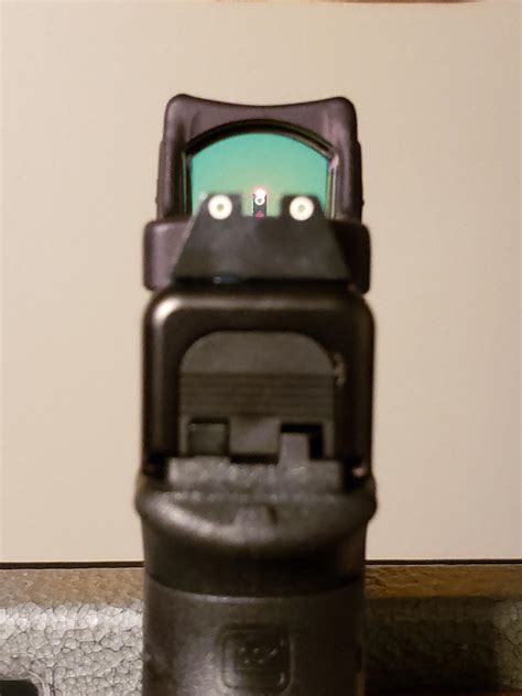 Trijicon RM06 Type 2 3.25 MOA dot with Trijicon white outline supressor sights. : r/aimdownsights