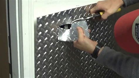 Part 1 - Installing aluminum diamond plate wall panels in garage, how to cut around an outlet ...