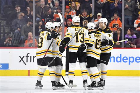 Bruins clip Flyers for NHL-record 63rd win | Reuters