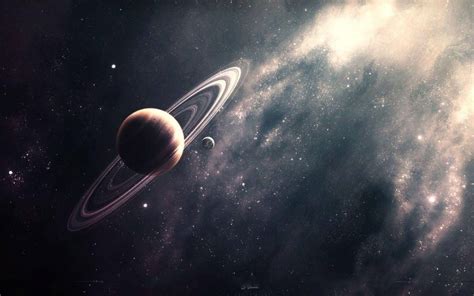 Download Stunning Planet Saturn With Rings Wallpaper | Wallpapers.com