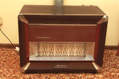 Sold at Auction: L55 VINTAGE WARM MORNING GAS HEATER