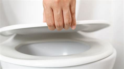 Why you should put the toilet lid down when flushing