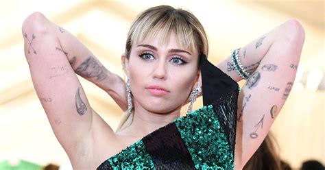 Miley Cyrus' Tattoos: Guide to All Her Ink and Their Meanings