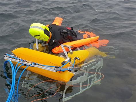 Underwater robot rises from the depths to save drowning swimmers