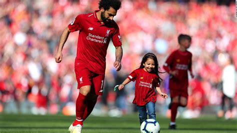 Proud dad Mo Salah looks on as daughter enjoys goal at Anfield - CNN