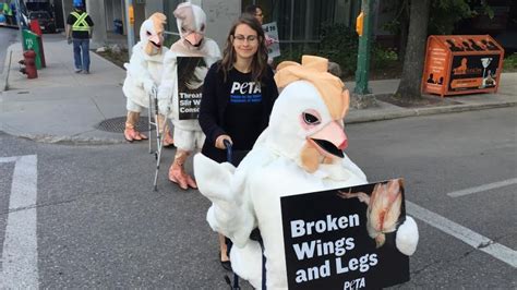 PETA activists dress as 'crippled' chickens in downtown Winnipeg - Manitoba - CBC News