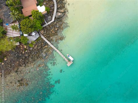 Aerial drone view of beautiful beach with turquoise sea water and palm ...