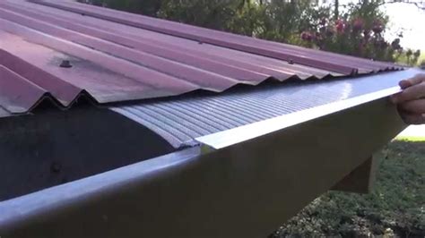 EasyOn Gutterguard: Installing on corrugated metal roof - YouTube