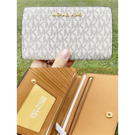 Michael Kors - Michael Kors Jet Set Travel PVC Slim Bifold Wallet ...