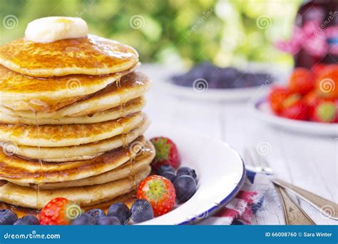 Stack of Pancakes with Fresh Fruit, Syrup and Butter Stock Photo ...