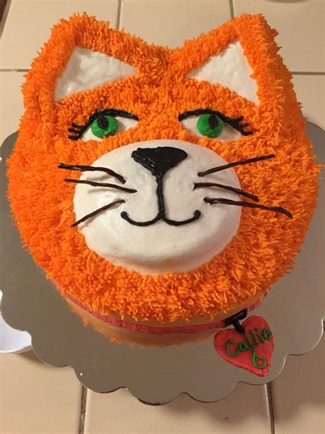 Orange cat birthday cake with collar and name tag. | Cat birthday, Birthday cake for cat, Cat cake