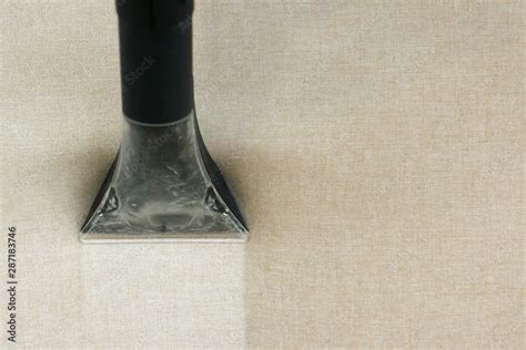 sofa upholstery after cleaning with a steam vacuum cleaner Stock Photo | Adobe Stock