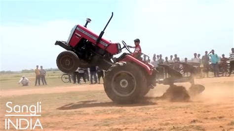 10 yr old performing stunts on tractor like a BOSS - Video