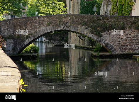 bridge and canal in the historic center of Bruges Belgium Europe Stock ...