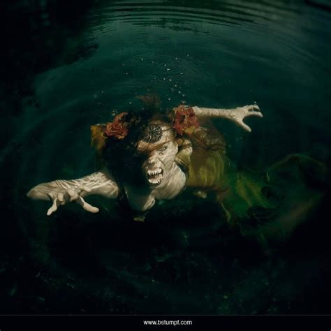 Photo of a scary evil mermaid attack in the cenoted cavern and freshwater cave system of Playa ...