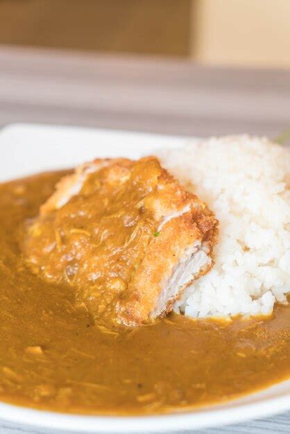 Premium Photo | Fried pork with curry rice