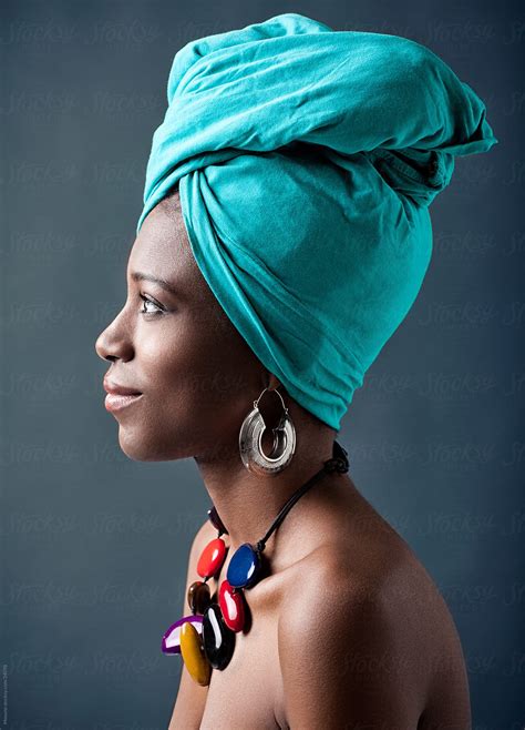 "Beautiful African Woman With A Turban On Her Head." by Stocksy Contributor "Mosuno" - Stocksy
