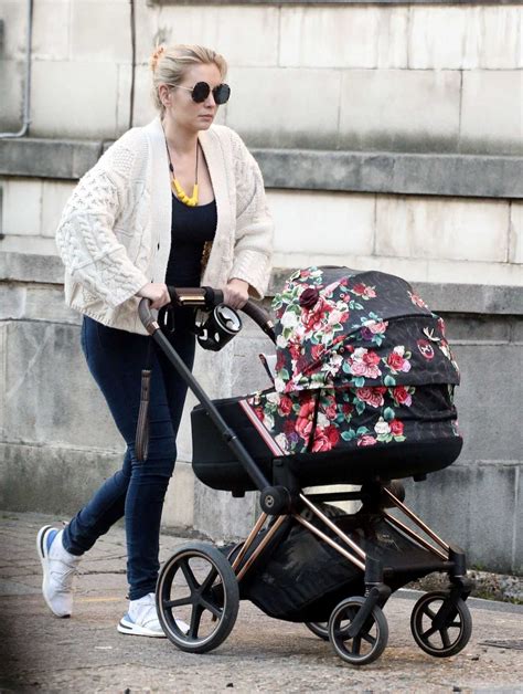 Rachel Riley – Seen with baby daughter Maven Aria in Central London ...