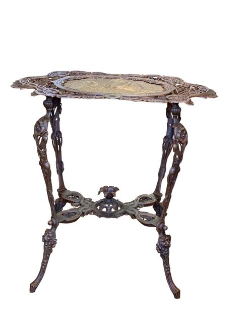 For Sale on 1stdibs - A lovely French Art Nouveau gilt and patinated bronze side table. The ...