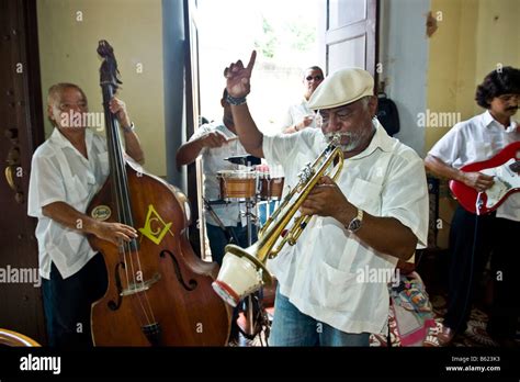 Cuban jazz musicians playing in a restaurant, Plaza Mayor, Trinidad ...