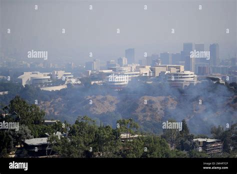 The Getty Center is covered in smoke as the Getty fire burns Monday ...