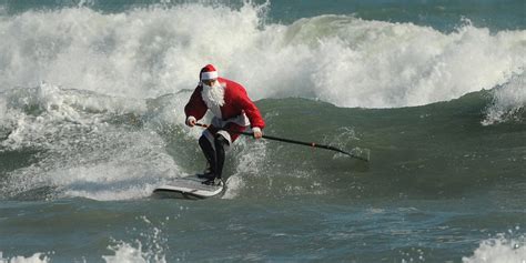 Surfing Santas ready to paddle out on Christmas Eve after pandemic ...