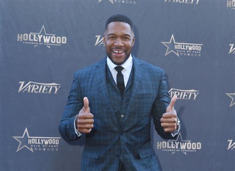 GMA's Michael Strahan ditches suit for comfy sweats and sneakers in off ...