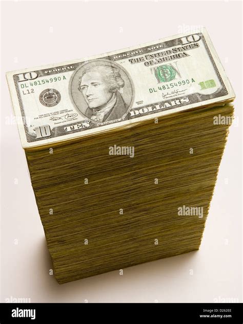 Cash stack of 10 dollar bills Stock Photo - Alamy