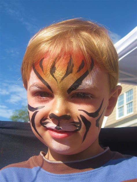 Wordless Wednesday: Landon's First Face Painting | Tiger face paints, Face painting designs ...