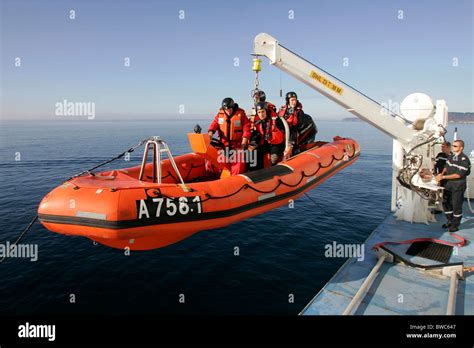 Starboard inflatable lifeboat launching into the Mer d'Iroise sea ...