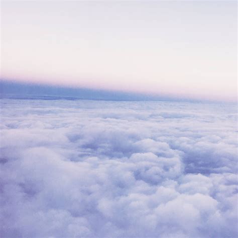 Download Periwinkle Sky Above Clouds Wallpaper | Wallpapers.com