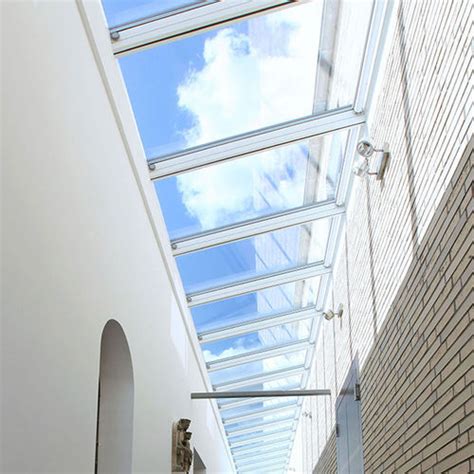 Flat roof skylight - WALL-MOUNTED LONGLIGHT - VITRAL - for inclined roofs / double-glazed / with ...