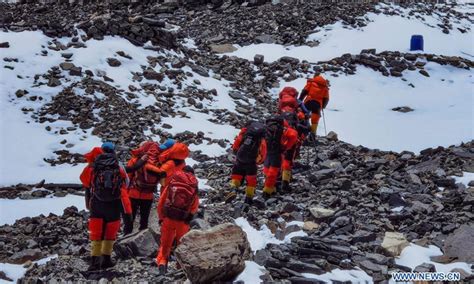 Remeasuring team heading to Mt. Qomolangma summit again after delayed ...