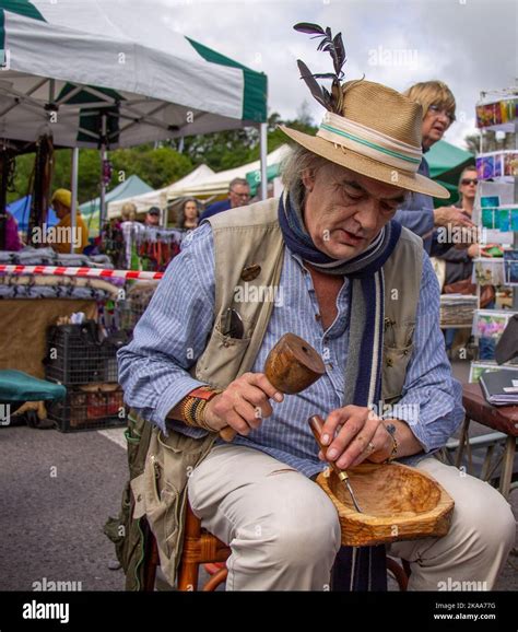 Poet and Author Ian Bailey carving a wooden bowl with a chisel Stock ...